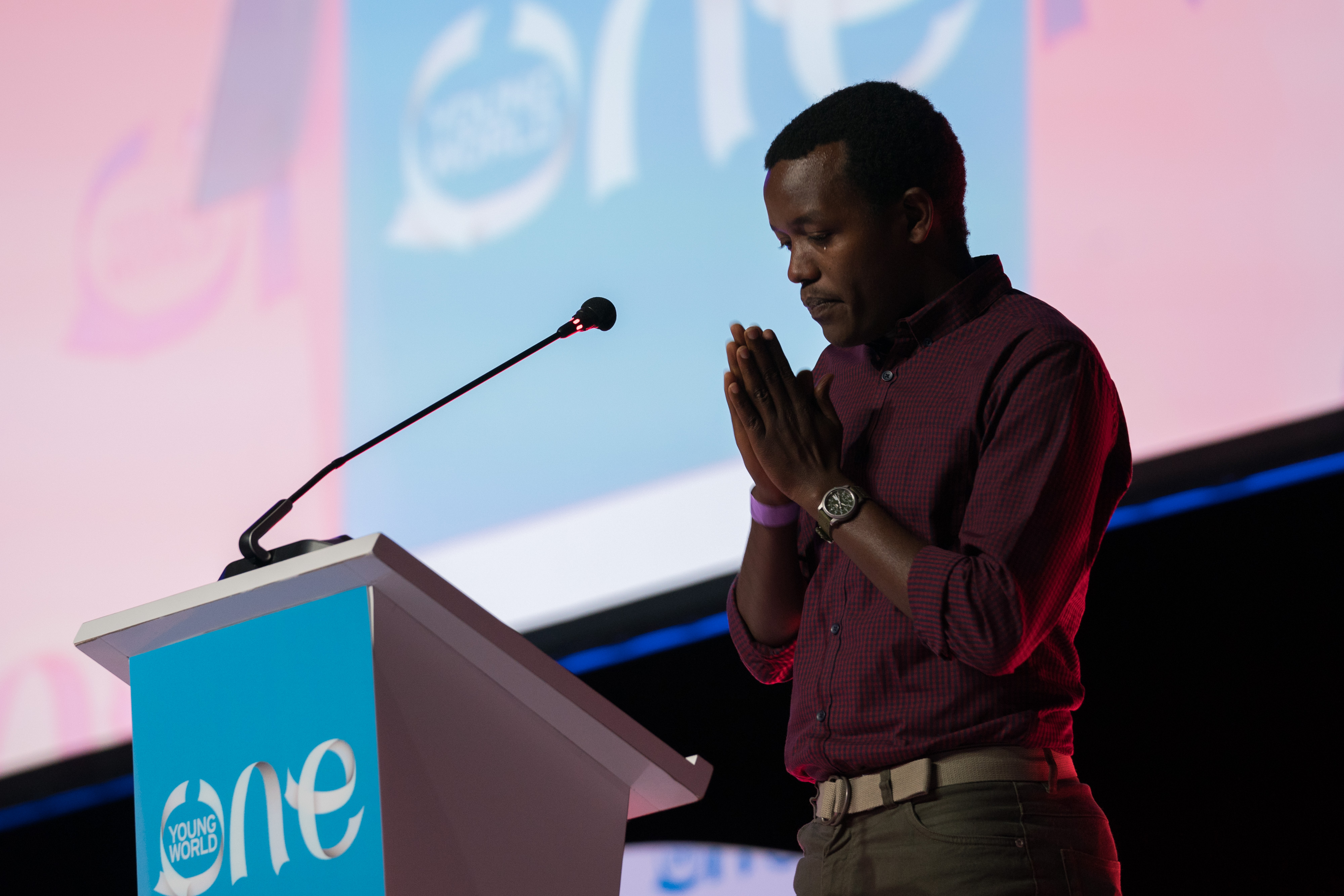 Hyppolite Ntigurirwa reacting to the audience's applause at One Young World 2017