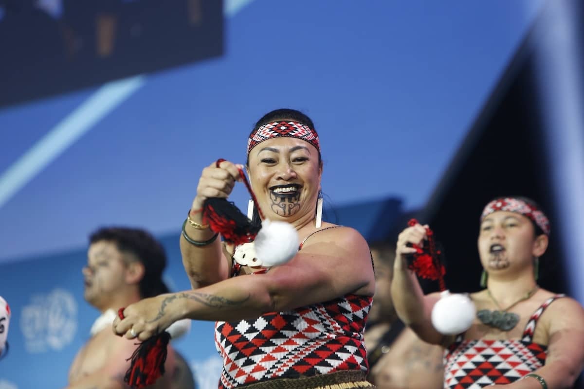 Indigenous dancers on stage at Summit 2024