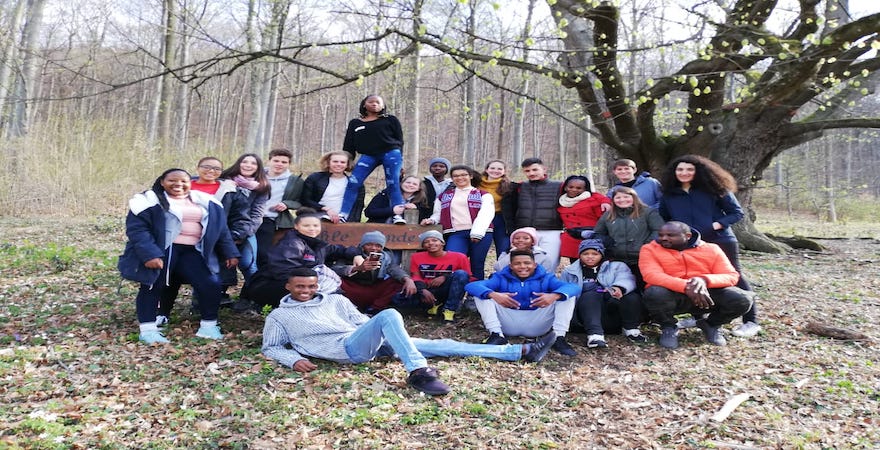 The exchange participants pose for a group photo