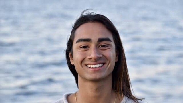 Bodhi Patil headshot photo against sea beach background